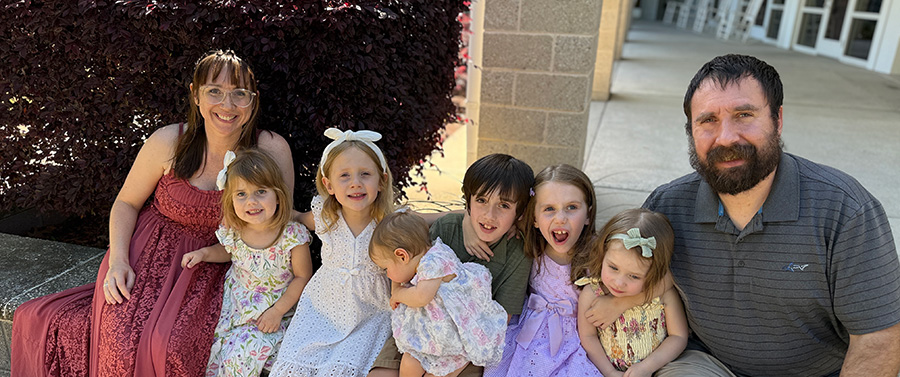 Austin, founder of Autonomic, with his wife and six children in South Carolina